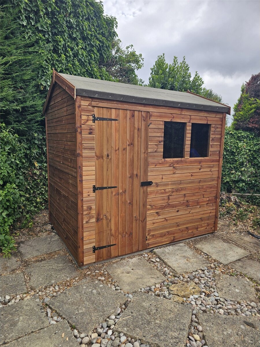 Tanalised pressure-treated wooden shed